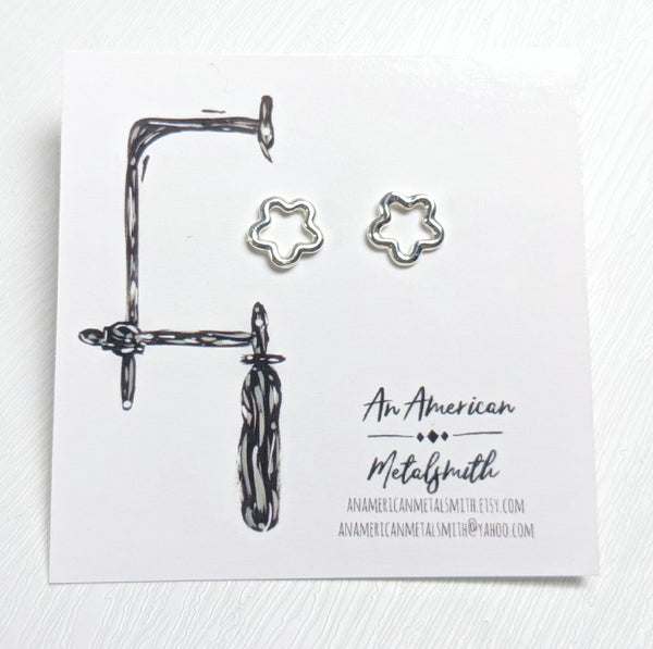 Flower stud earrings made by An American Metalsmith