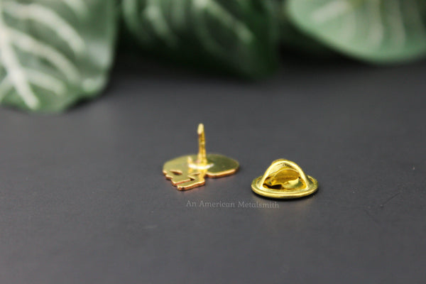 Brass skull pin backing made by An American Metalsmith