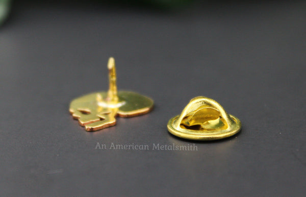 Brass skull pin backing made by An American Metalsmith