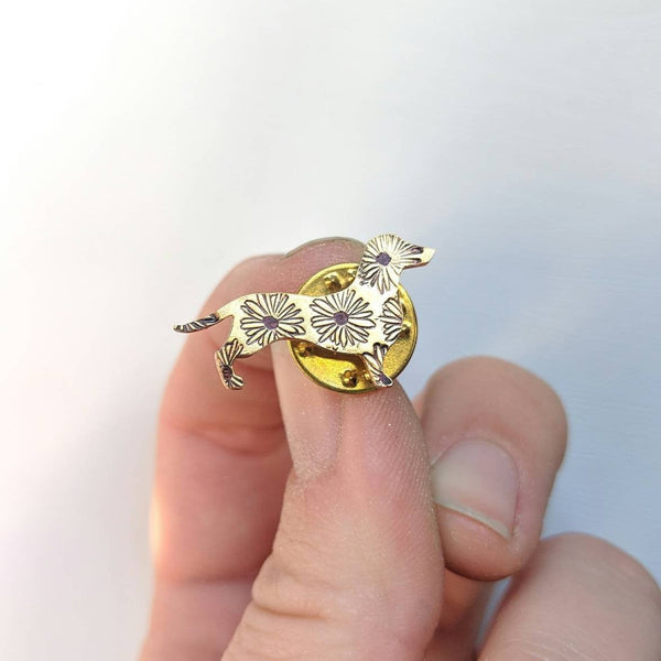 Brass dachshund pin with daisy stamps made by An American Metalsmith