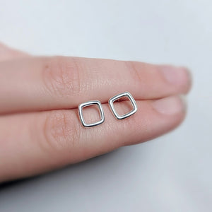 Square stud earrings made by An American Metalsmith